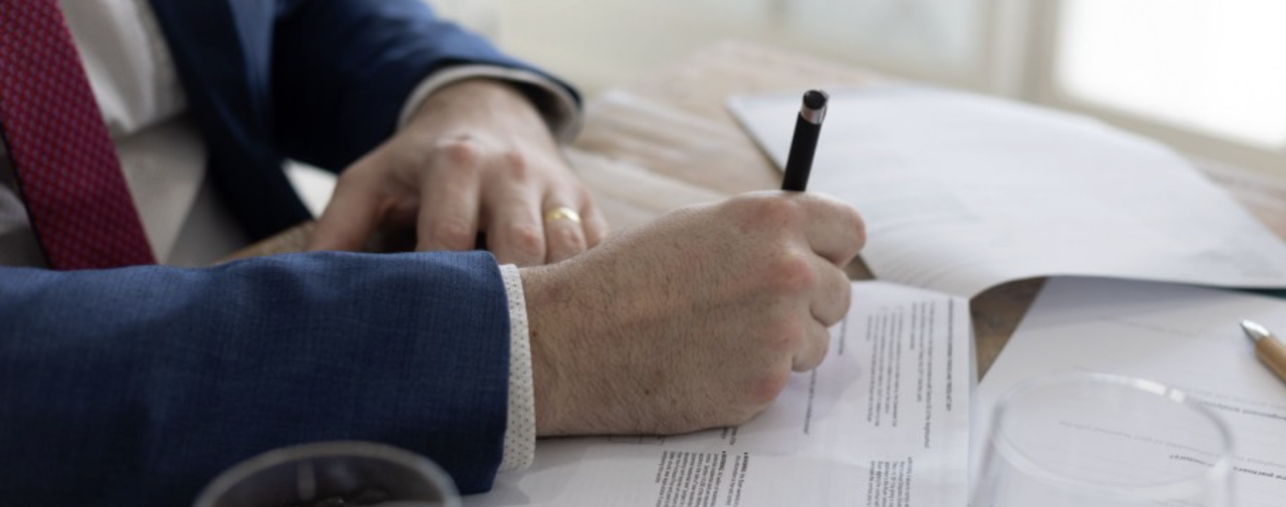 Screenshot 2025-09-24 at 10.00.27 AM Hand signing contract